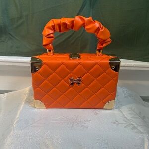 Vibrant Orange Quilted Mini Bag with Gold Details